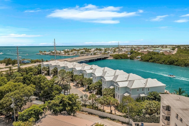 bird's eye view with a water view and a residential view