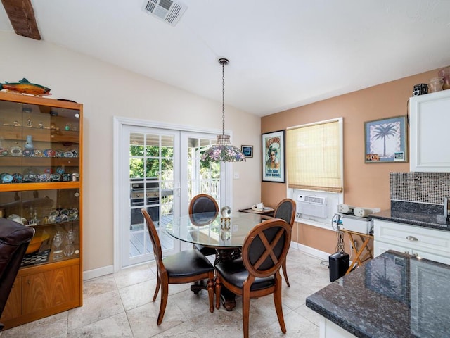3806 Dyer Rd, Big Pine, FL 33043 - dining room with vaulted ceiling, cooling unit, and baseboards