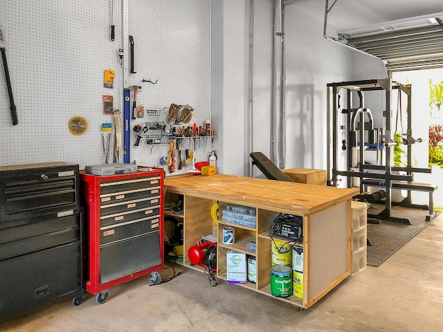 garage with a workshop area