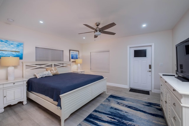 bedroom featuring ceiling fan and light wood-type flooring