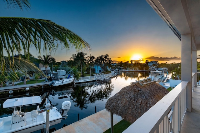 property view of water featuring a dock