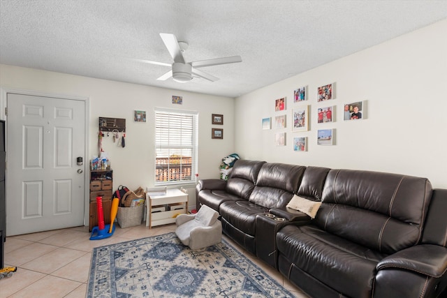 3397 Northside Dr Unit 4, Key West, FL 33040 - living room with ceiling fan, light tile patterned floors, and a textured ceiling