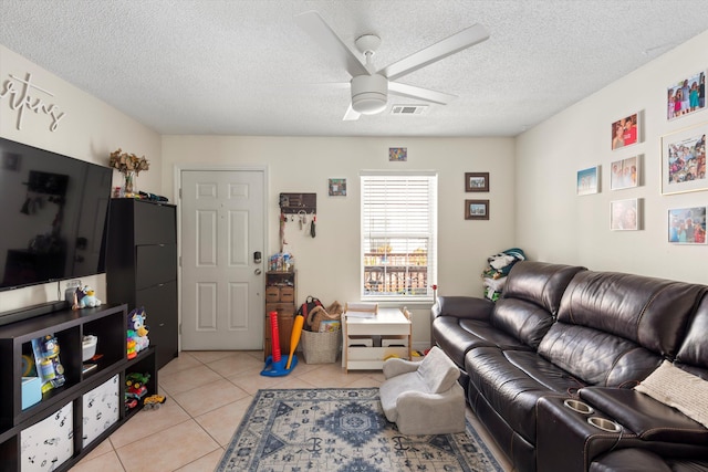 3397 Northside Dr Unit 4, Key West, FL 33040 - living room with ceiling fan, light tile patterned flooring, and a textured ceiling