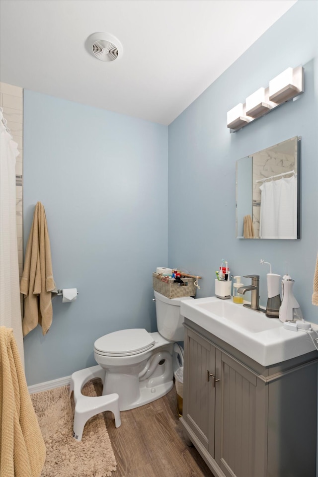3397 Northside Dr Unit 4, Key West, FL 33040 - full bath with vanity, wood finished floors, and curtained shower