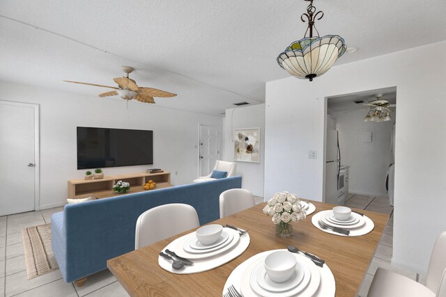 40 High Point Rd Unit F-206, Tavernier, FL 33070 - dining room with ceiling fan, light tile patterned floors, washer / dryer, and a textured ceiling