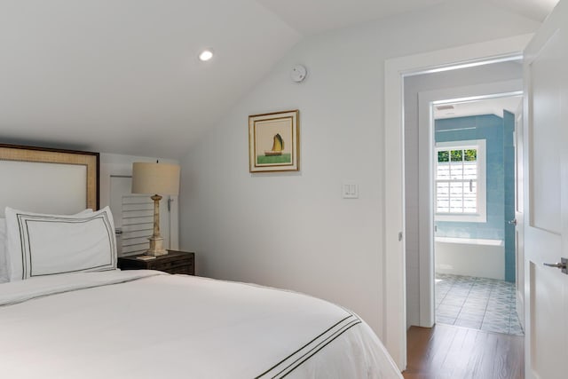 806 Southard St, Key West, FL 33040 - bedroom featuring wood finished floors, recessed lighting, ensuite bath, and lofted ceiling