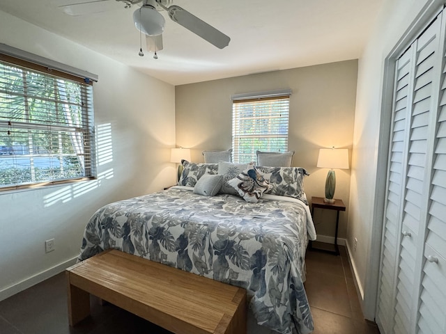 1728 Laird St, Key West, FL 33040 - tiled bedroom featuring ceiling fan and baseboards