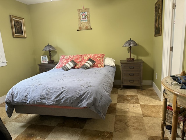 1 Sunset Rd, Key Largo, FL 33037 - bedroom with stone finish flooring and baseboards