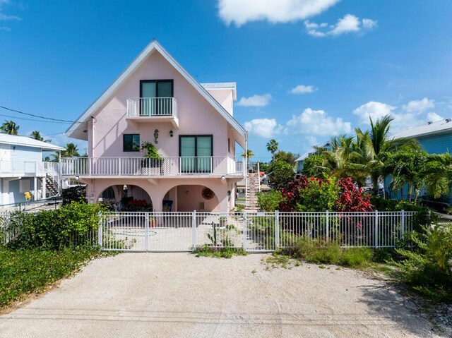 view of front of home with a balcony