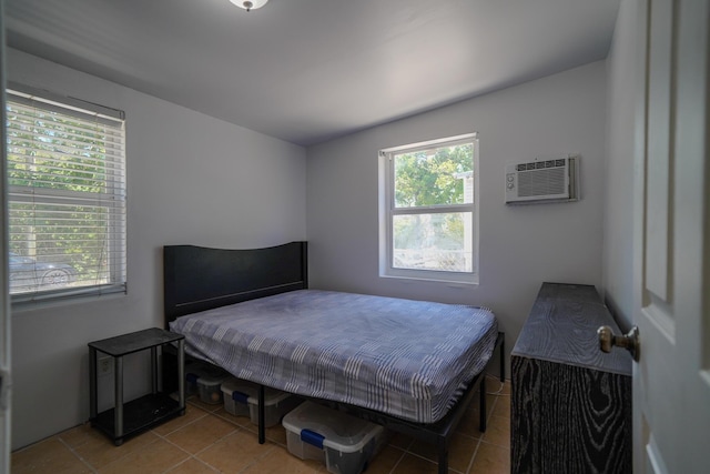 tiled bedroom with an AC wall unit