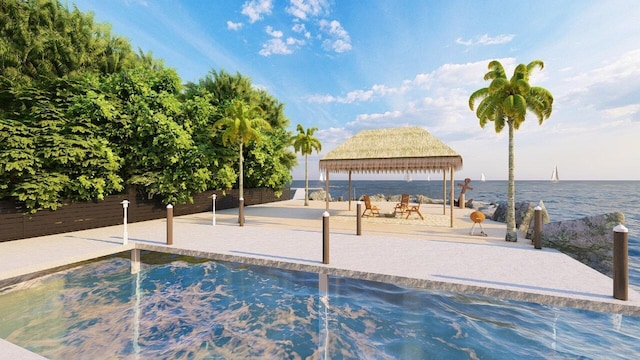 view of pool featuring a gazebo and a water view