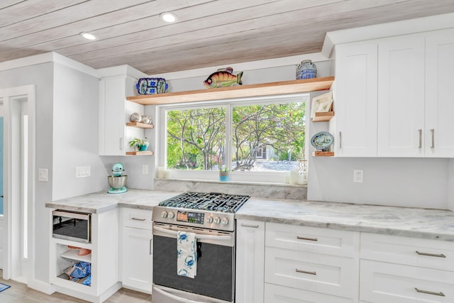 20735 W 5th Ave, Cudjoe, FL 33042 - kitchen with open shelves, stainless steel appliances, white cabinetry, recessed lighting, and wood ceiling
