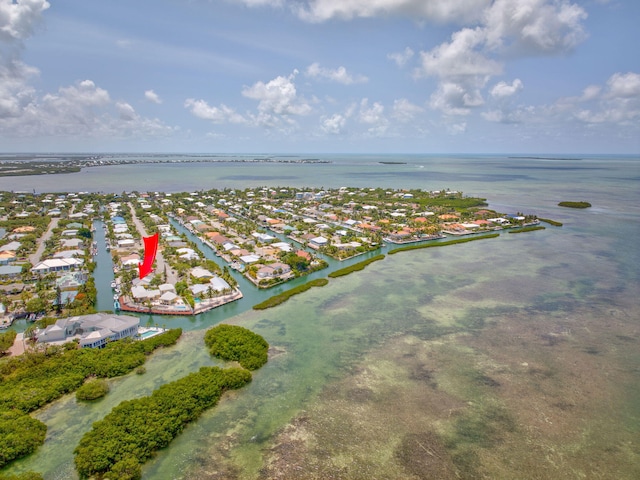 20735 W 5th Ave, Cudjoe, FL 33042 - aerial perspective of suburban area featuring a large body of water