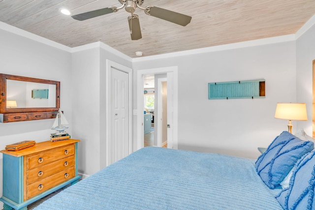 20735 W 5th Ave, Cudjoe, FL 33042 - bedroom featuring wood ceiling, ceiling fan, and a closet
