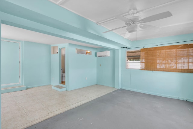 empty room with a wall unit AC and ceiling fan