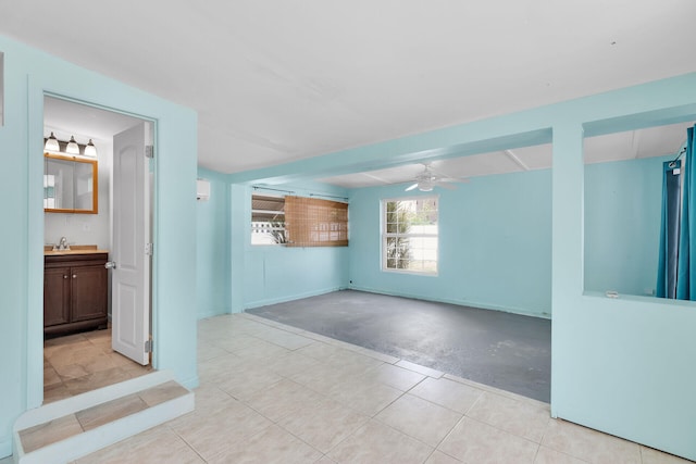 unfurnished room featuring ceiling fan