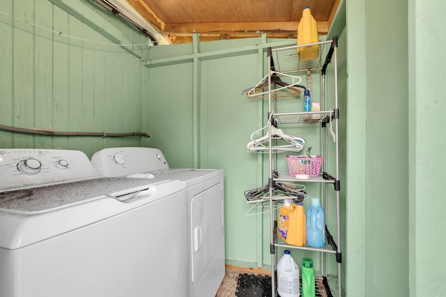 clothes washing area with washer and dryer