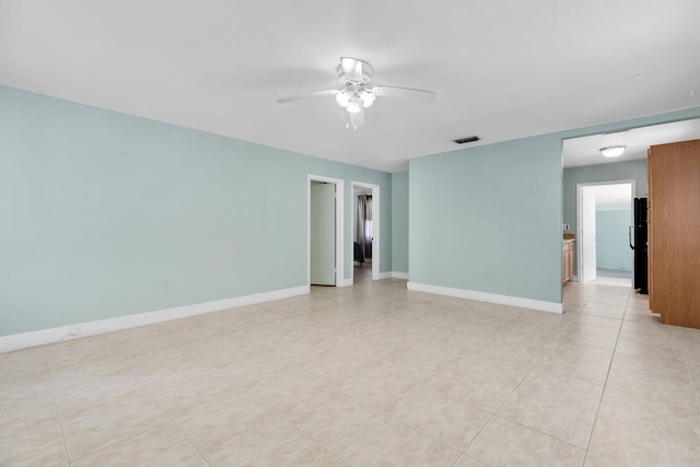 unfurnished room featuring ceiling fan