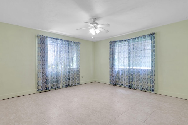 unfurnished room featuring ceiling fan