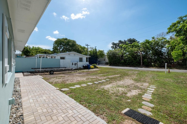 view of yard featuring fence