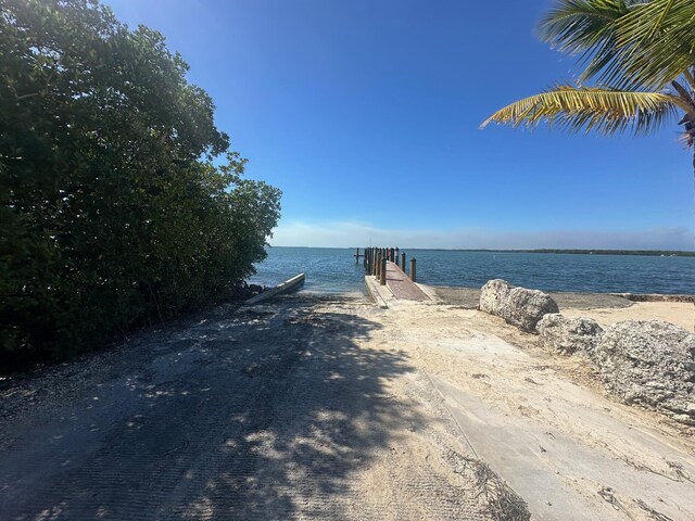 6 Silver Springs Dr, Key Largo, FL 33037 - water view featuring a dock