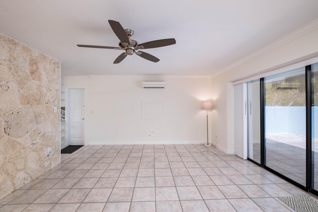 spare room featuring light tile patterned floors, a ceiling fan, crown molding, and a wall unit AC