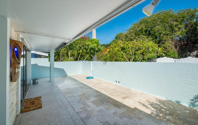 view of patio with fence