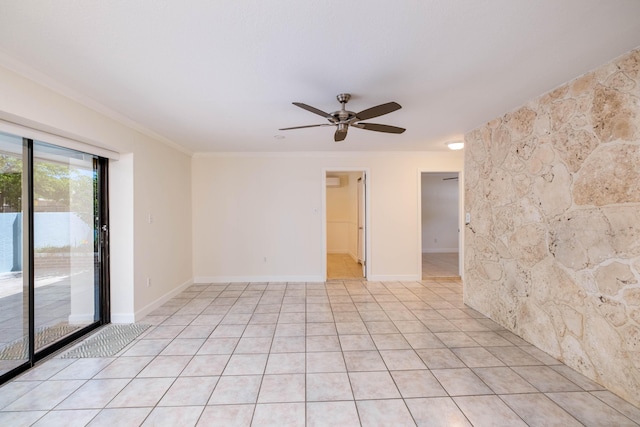 unfurnished room featuring light tile patterned floors, baseboards, ornamental molding, and a ceiling fan