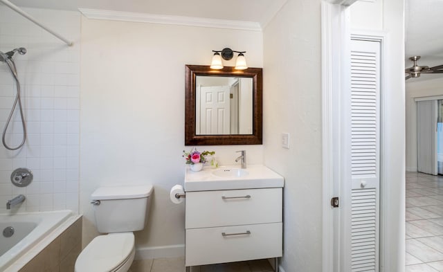 full bath featuring toilet, ornamental molding, tiled shower / bath combo, a closet, and vanity