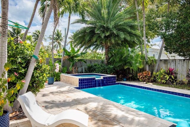3532 Duck Ave, Key West, FL 33040 - view of pool featuring a patio area, a pool with connected hot tub, and a fenced backyard
