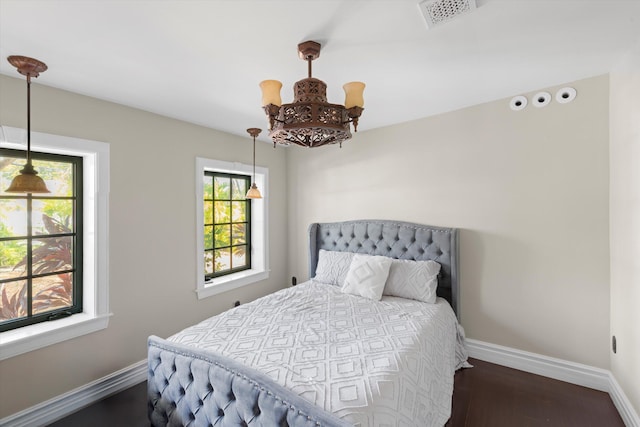 3532 Duck Ave, Key West, FL 33040 - bedroom with wood finished floors, visible vents, and baseboards
