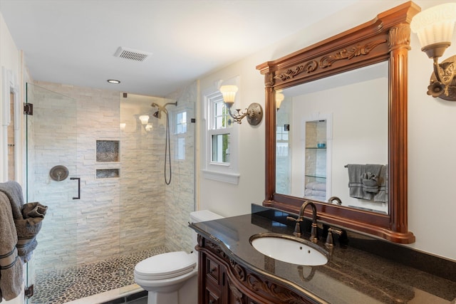 3532 Duck Ave, Key West, FL 33040 - full bathroom featuring vanity, toilet, visible vents, and a stall shower
