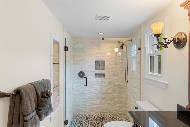 3532 Duck Ave, Key West, FL 33040 - full bathroom featuring vanity, toilet, visible vents, and a shower stall