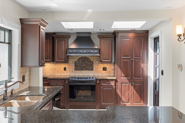 3532 Duck Ave, Key West, FL 33040 - kitchen featuring premium range hood, a skylight, a sink, and electric range