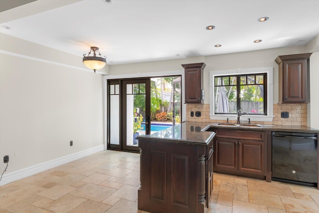 3532 Duck Ave, Key West, FL 33040 - kitchen featuring decorative backsplash, stone tile floors, a sink, and dishwasher