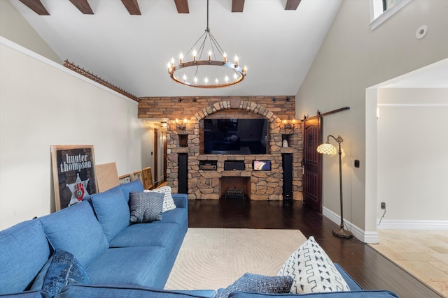 3532 Duck Ave, Key West, FL 33040 - living room with a barn door, baseboards, a chandelier, high vaulted ceiling, and wood finished floors