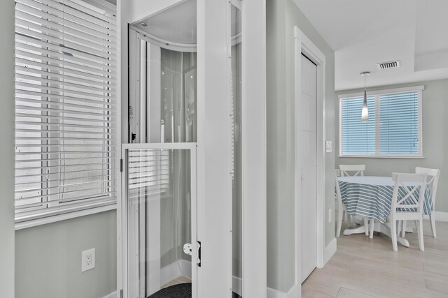 bathroom featuring hardwood / wood-style flooring