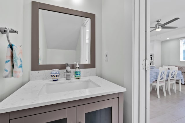 bathroom with vanity and ceiling fan