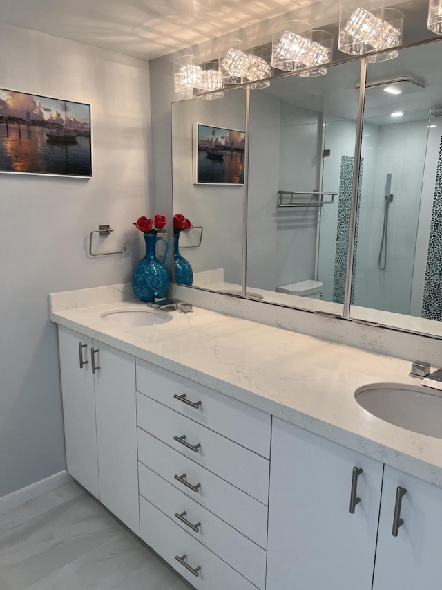 2000 Coco Plum Dr Unit 605, Marathon, FL 33050 - full bath featuring double vanity, marble finish flooring, and a stall shower
