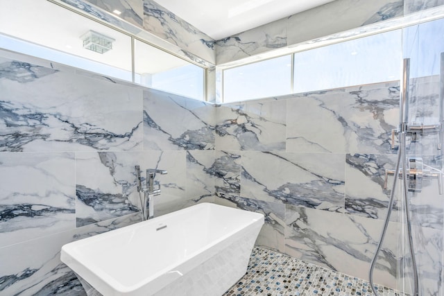 84 Coral Way -, Unit Key Largo, FL 33037 - full bath featuring a freestanding tub, tile walls, and a marble finish shower