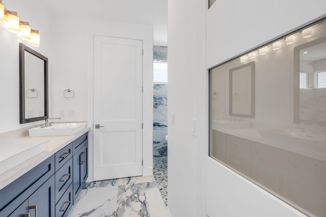 84 Coral Way -, Unit Key Largo, FL 33037 - full bathroom featuring marble look tile flooring, double vanity, and plenty of natural light