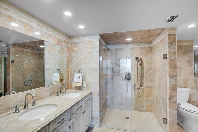 101 E Ocean Dr Unit C402, Key Colony, FL 33051 - full bath featuring visible vents, tile walls, and a sink