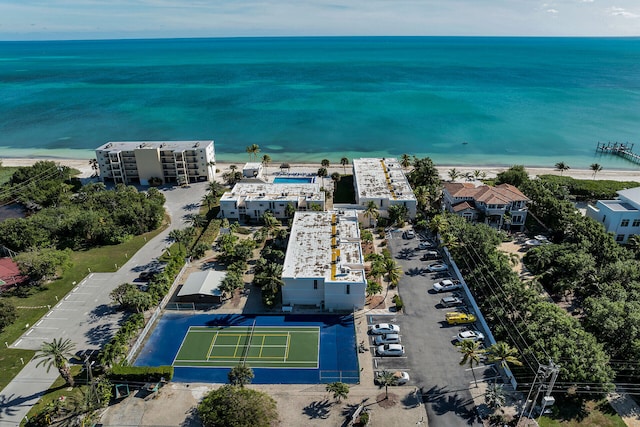 aerial view featuring a water view and a beach view