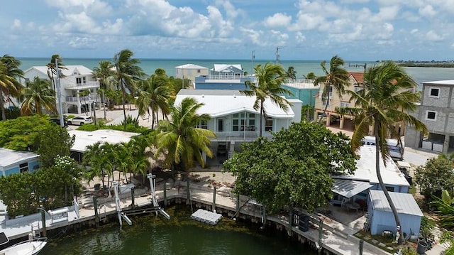 drone / aerial view featuring a water view