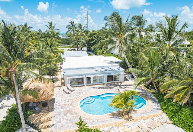 view of swimming pool with a patio