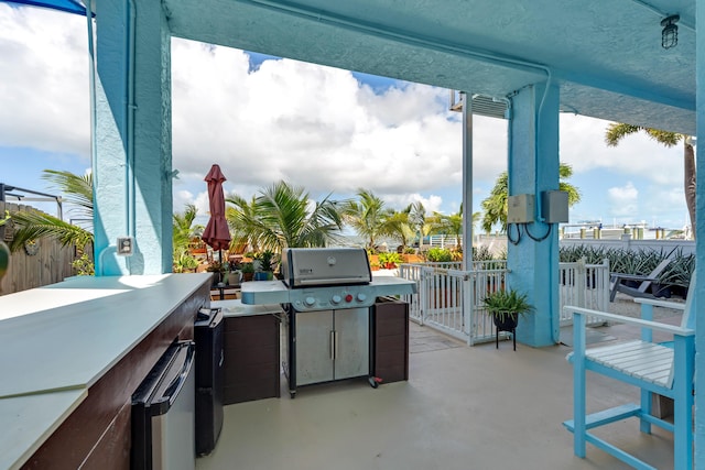 view of patio featuring an outdoor bar