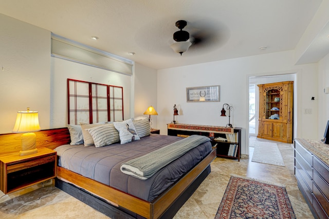 bedroom featuring ceiling fan