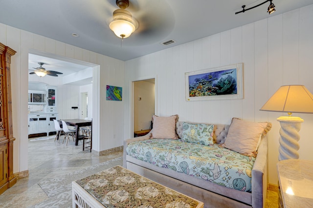 bedroom featuring visible vents and a ceiling fan