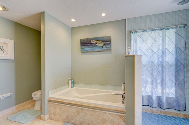 bathroom featuring a garden tub, a textured wall, toilet, a shower with curtain, and tile patterned floors