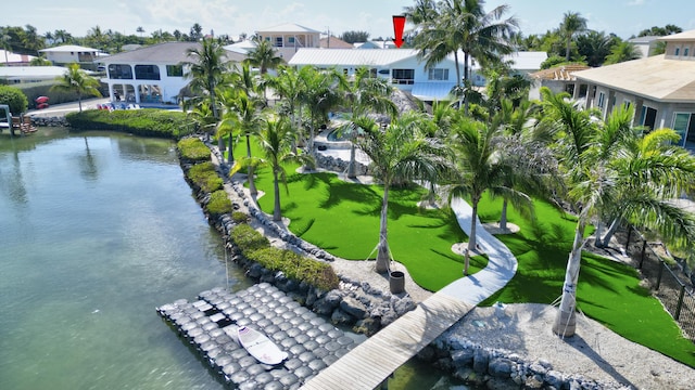 aerial view with a residential view and a water view